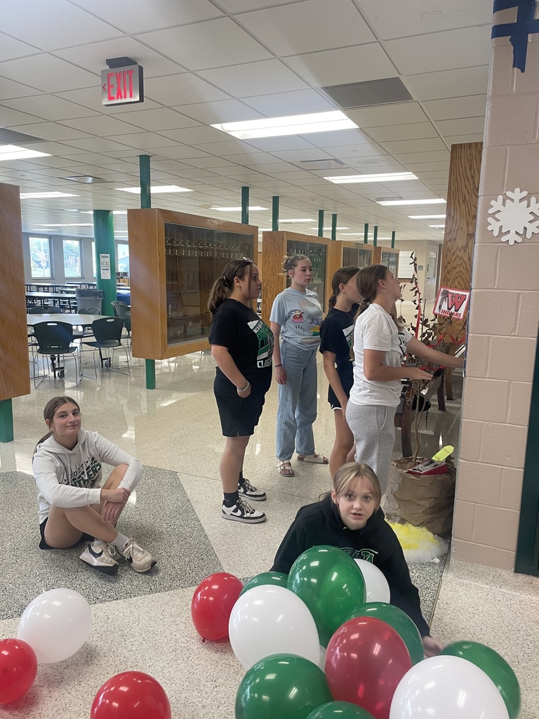 Students decorating the hallways for homecoming