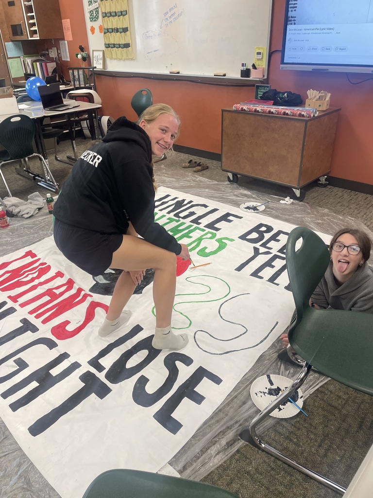 Students decorating the hallways for homecoming