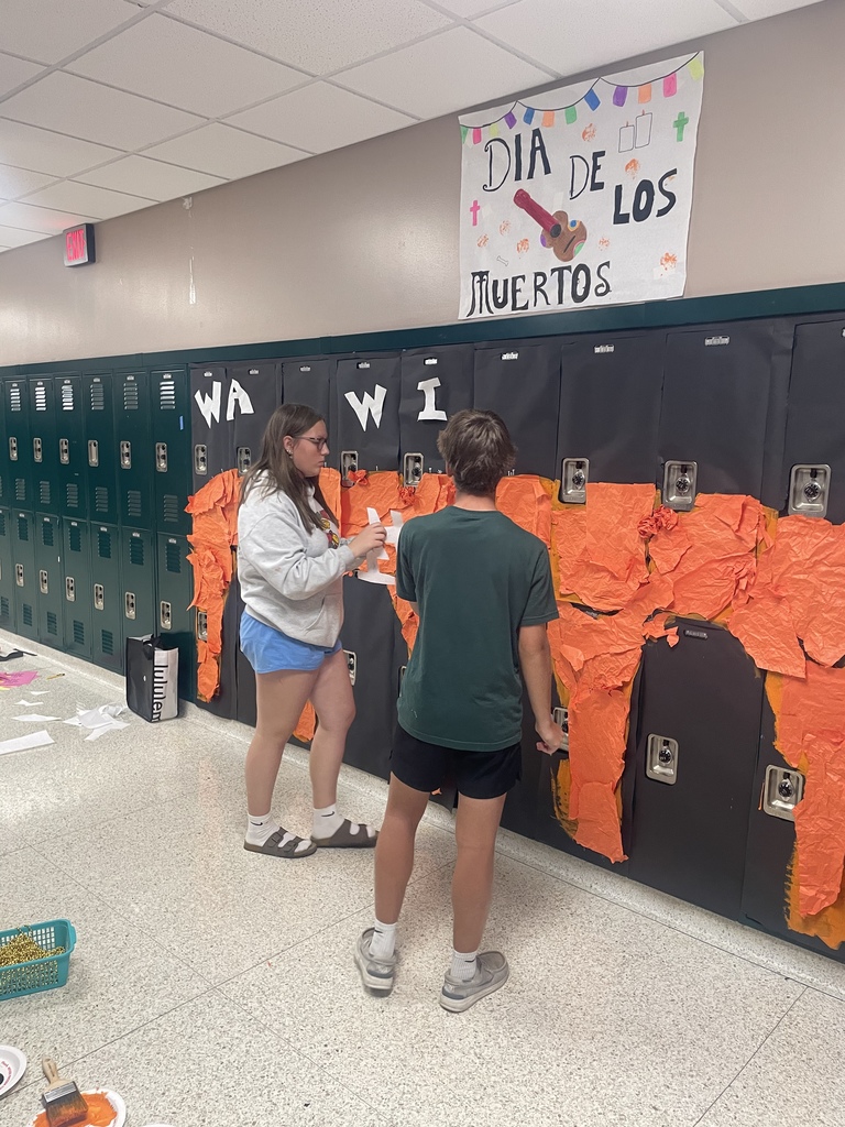 Students decorating the hallways for homecoming
