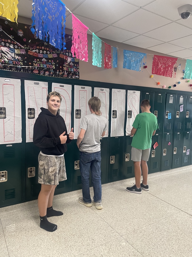 Students decorating the hallways for homecoming