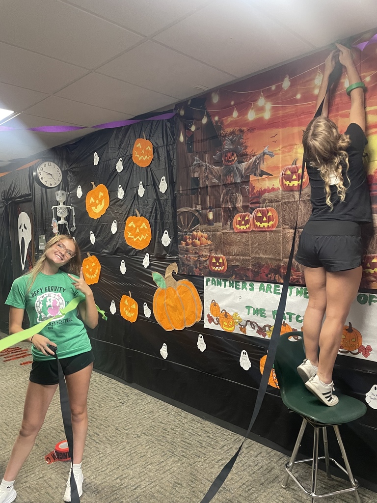 Students decorating the hallways for homecoming