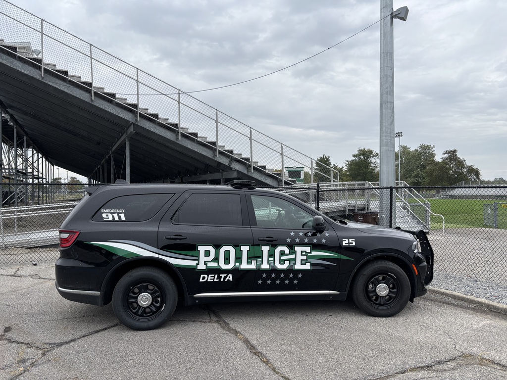 photo pf police car at the football stadium