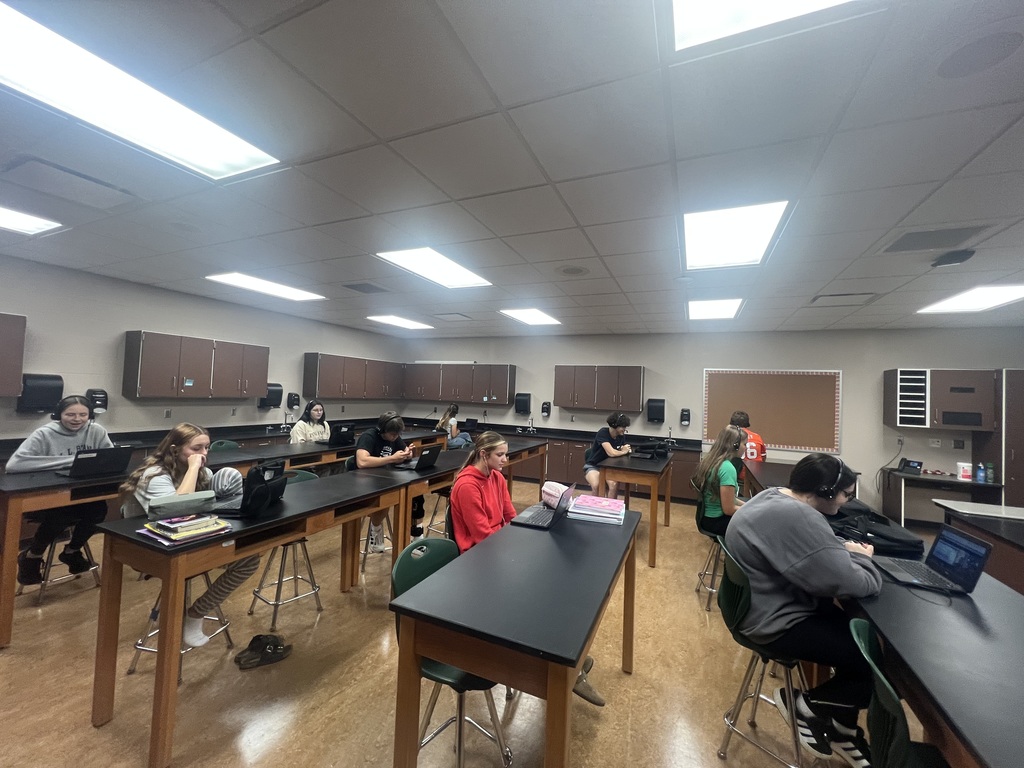 students meeting with coaches