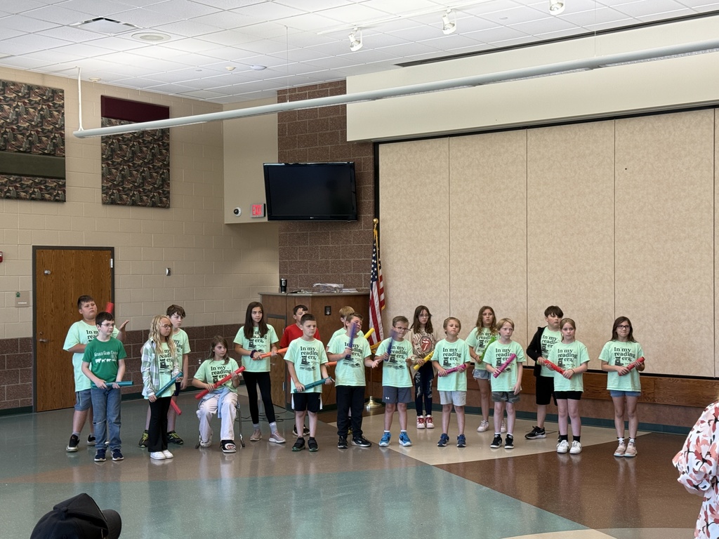 Students performing in a school