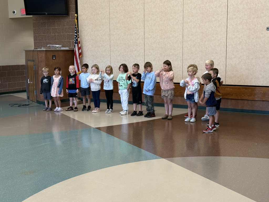 Students performing in a school