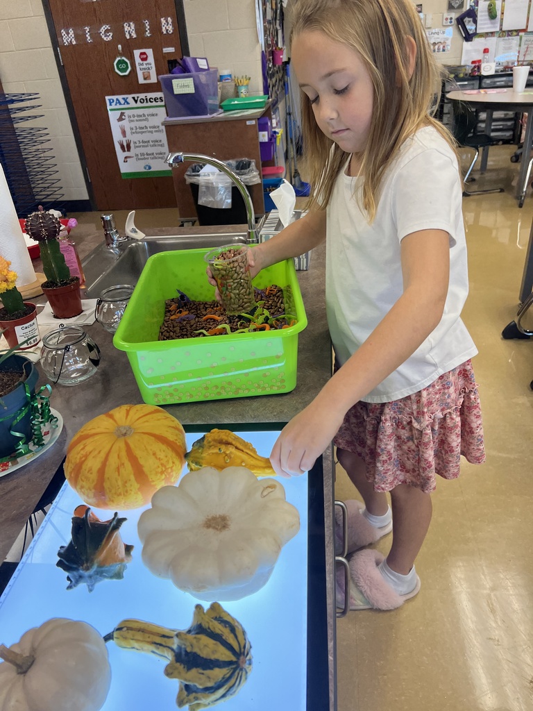 Students playing in a classroom