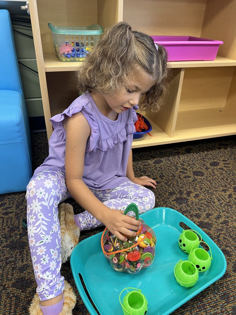 Students playing in a classroom