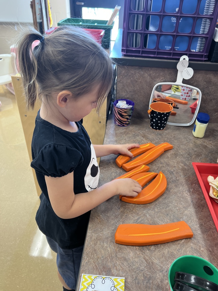 Students playing in a classroom