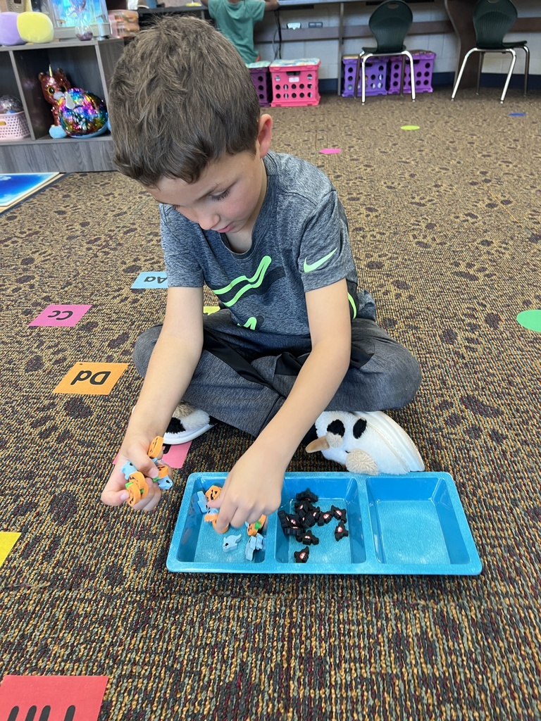 Students playing in a classroom