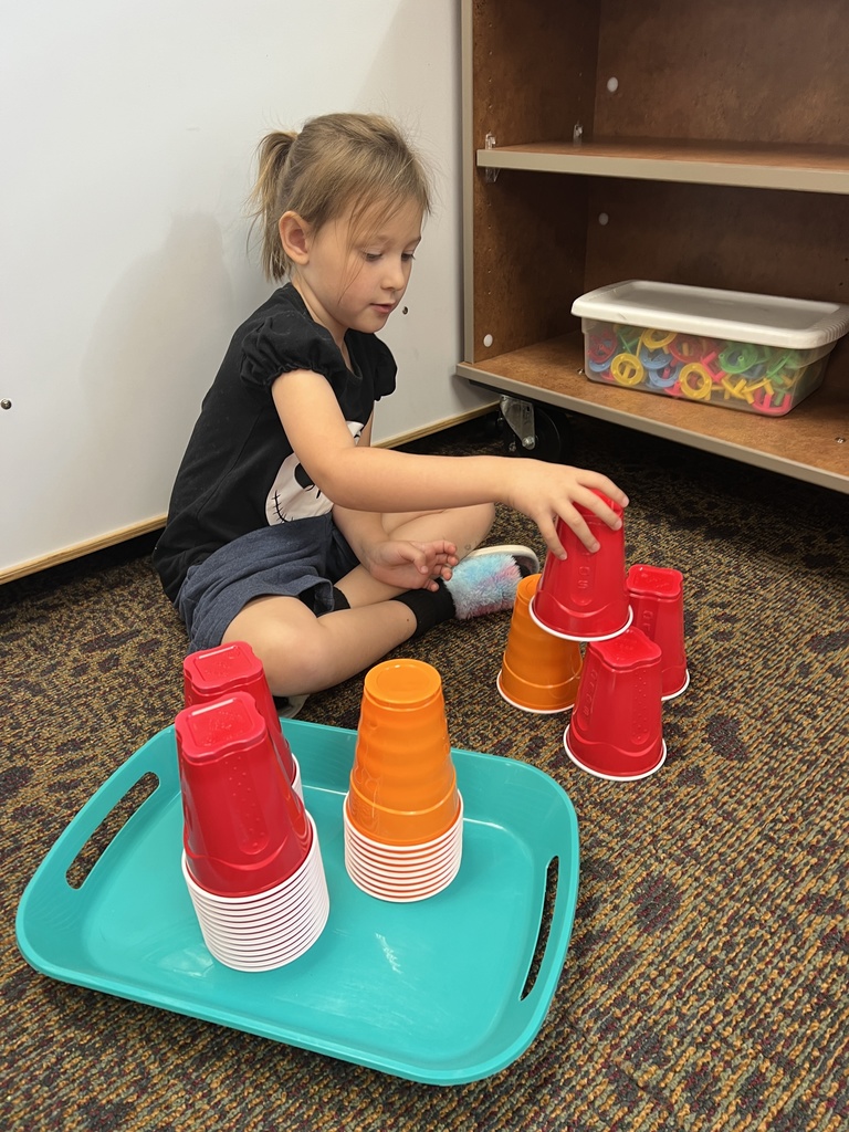 Students playing in a classroom