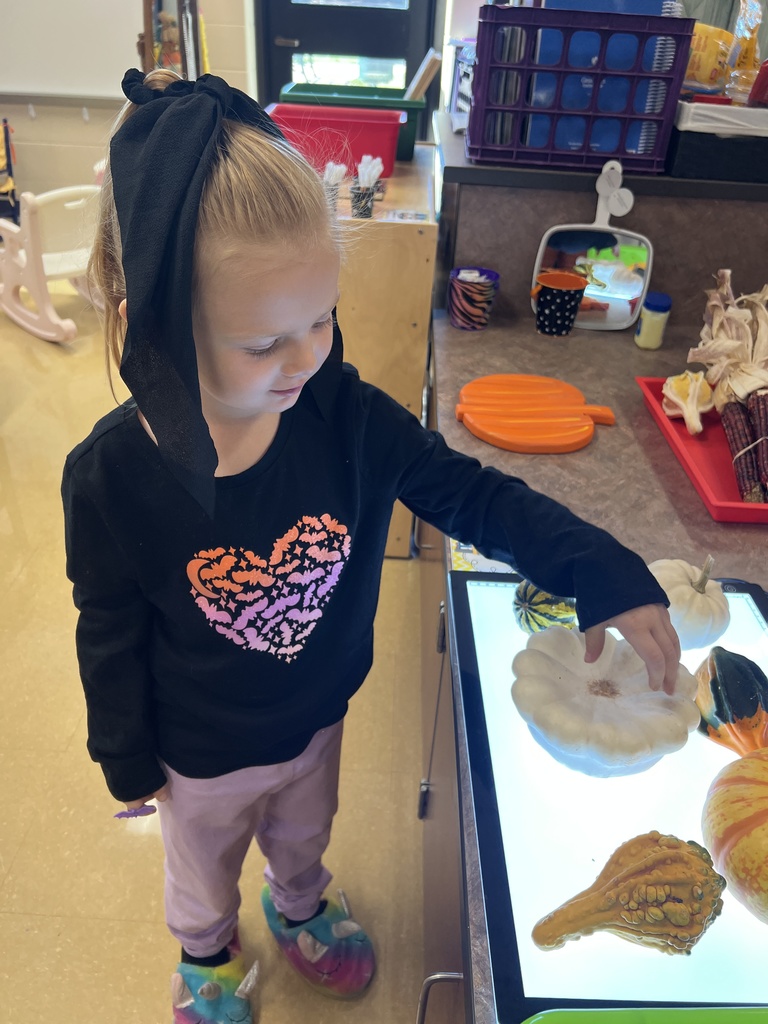 Students playing in a classroom