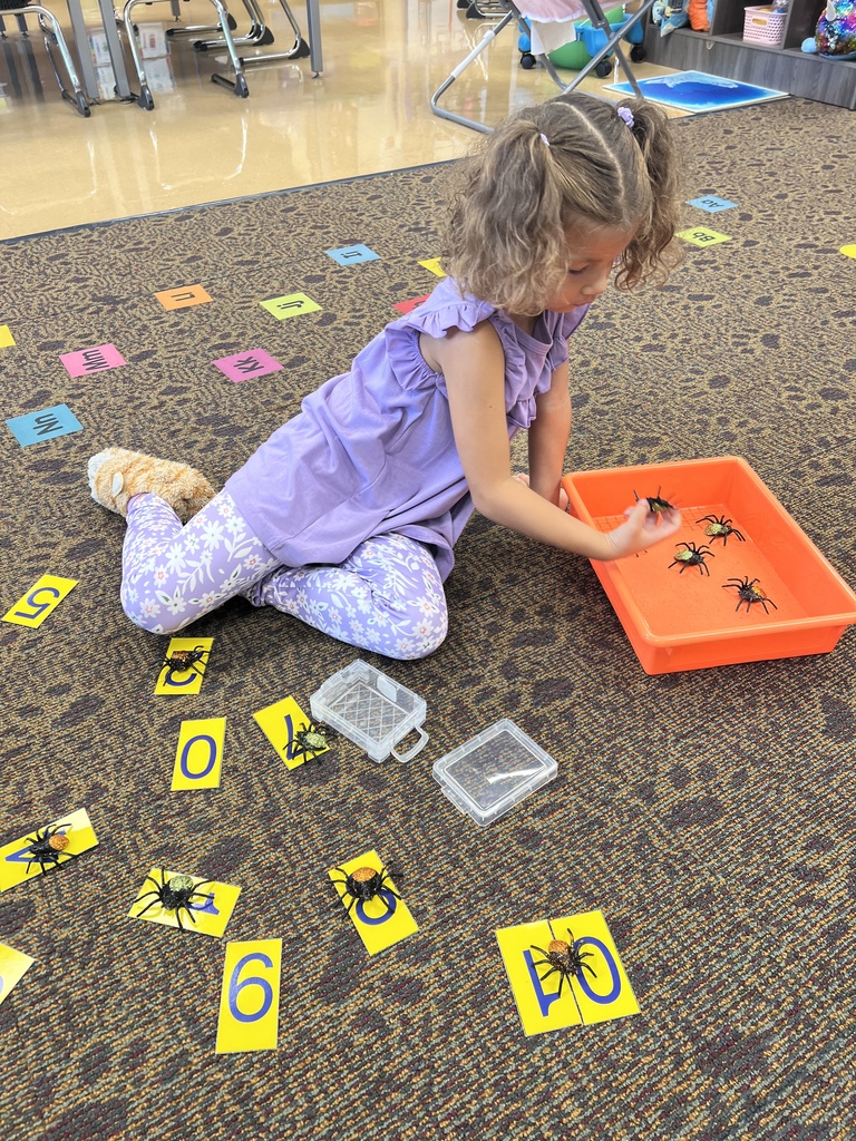 Students playing in a classroom