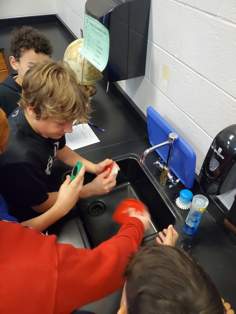 Students shaking a butter mixture