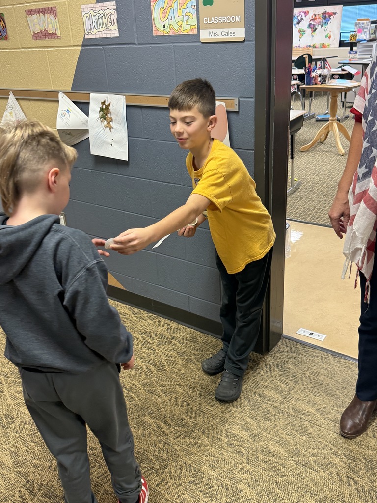 students getting their I voted stickers