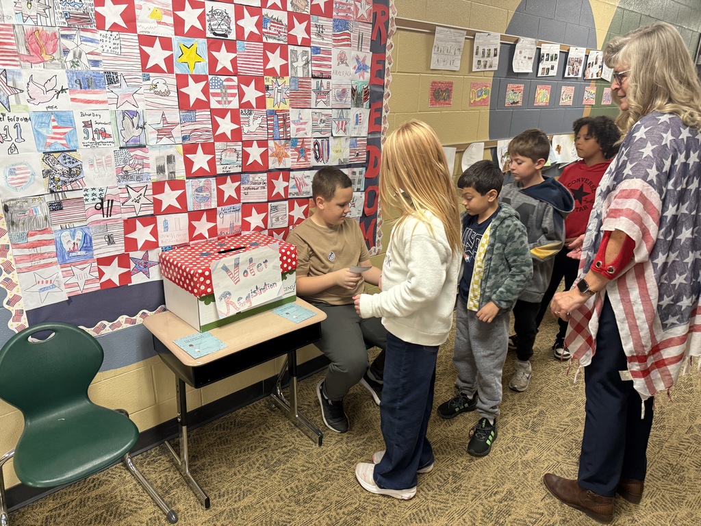 students turning in their voter registration