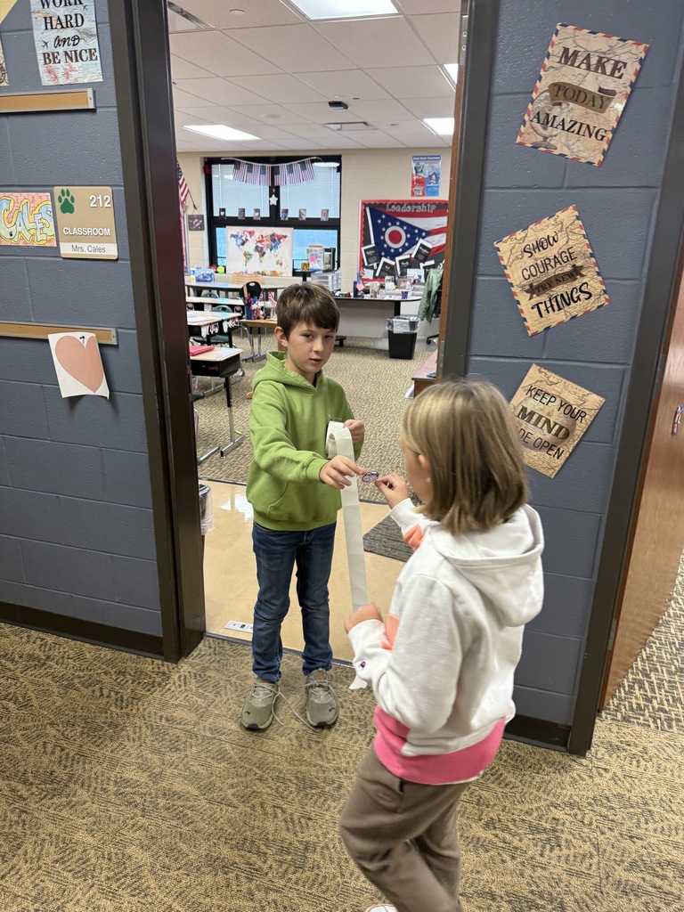 students getting their I voted stickers