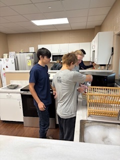students making smores in the kitchen lab