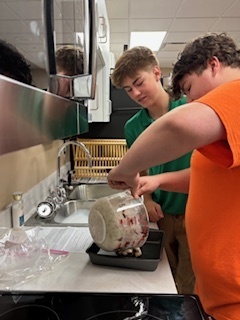 students making smores in the kitchen lab