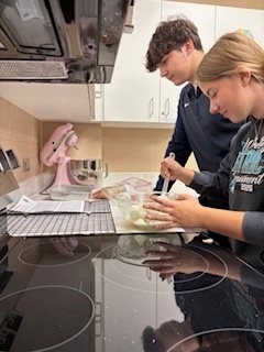 students making smores in the kitchen lab