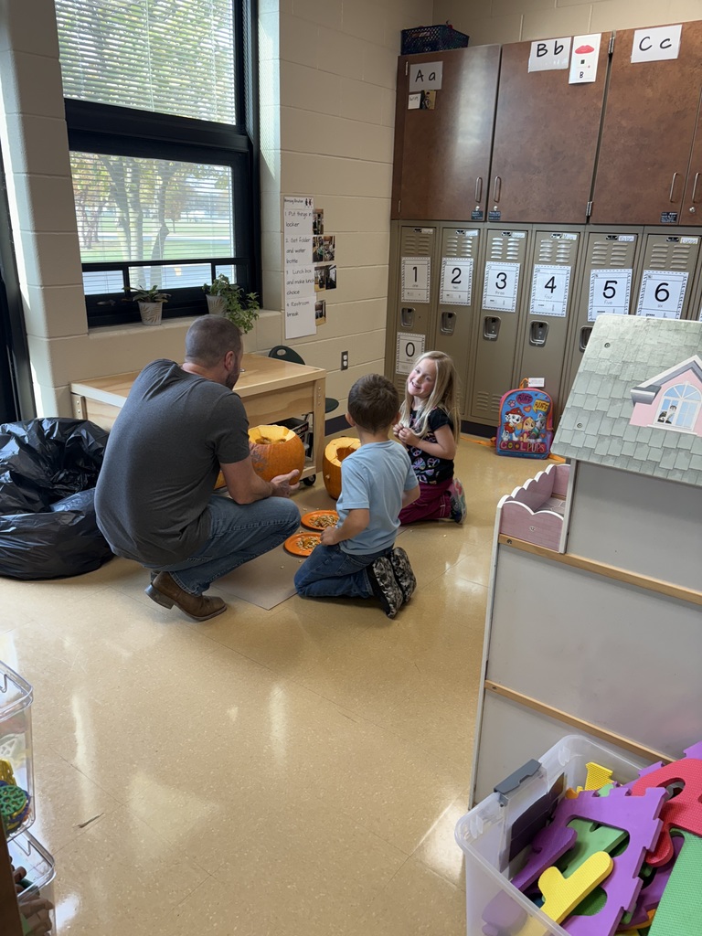 students playing in a classroom