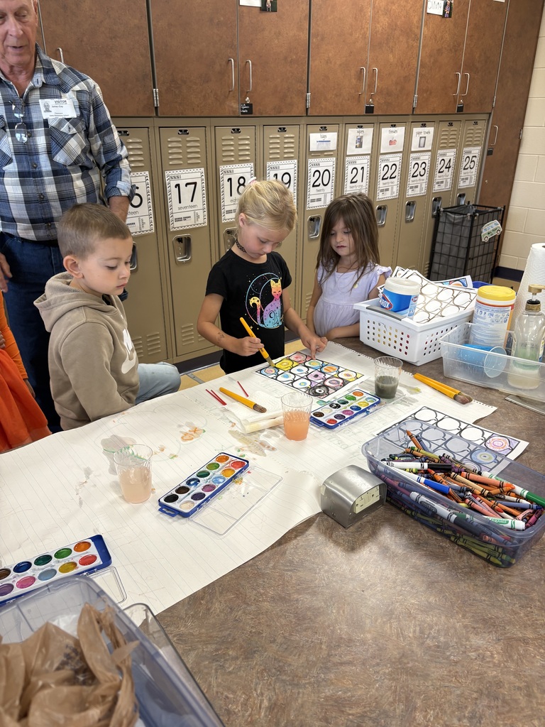 students playing in a classroom