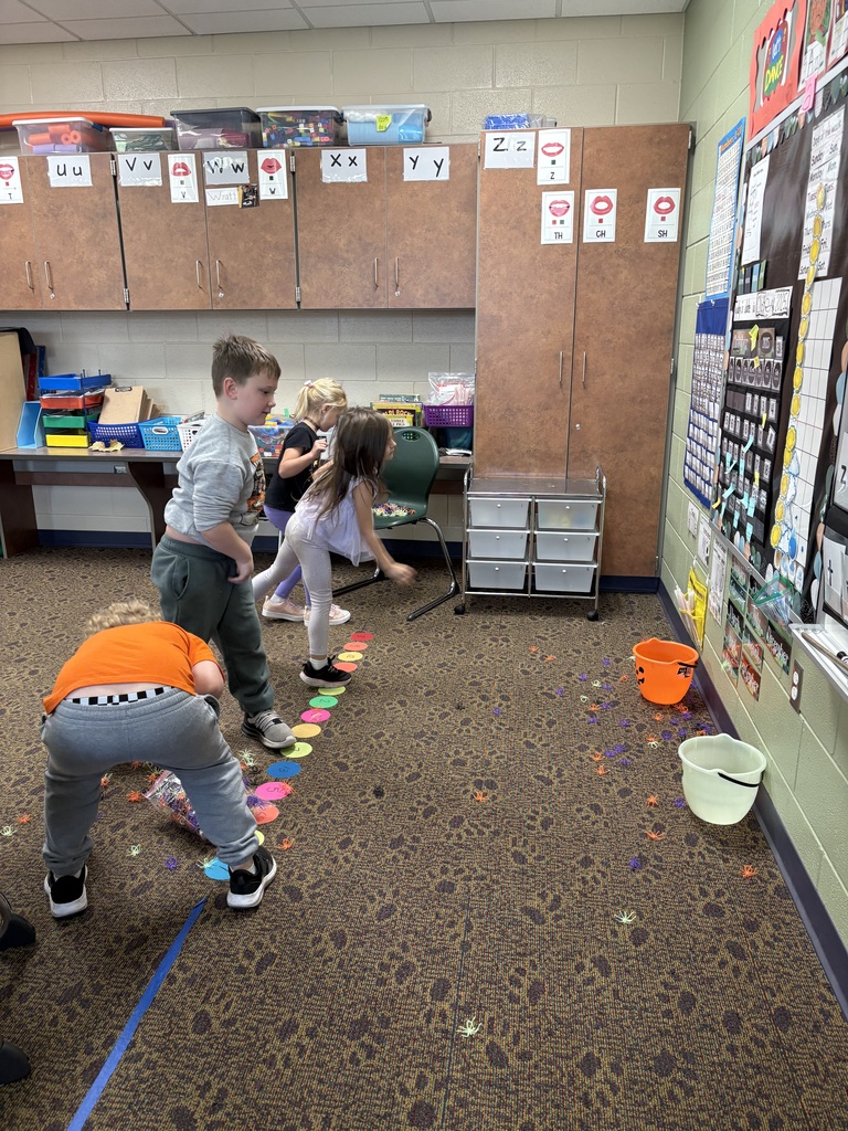 students playing in a classroom
