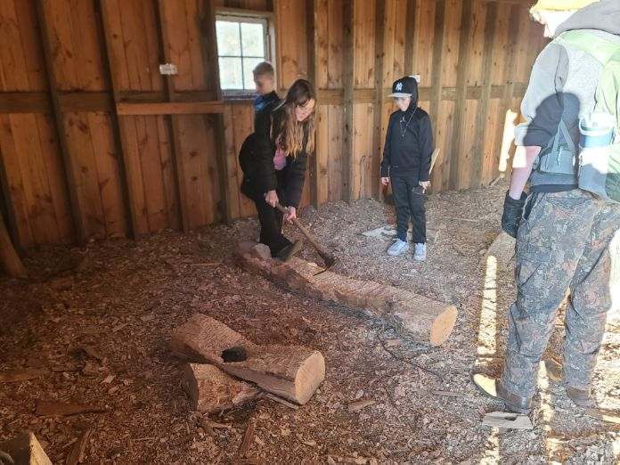 students out in the woods at camp