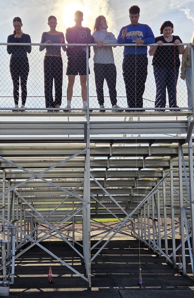 Students participating in a bungee drop