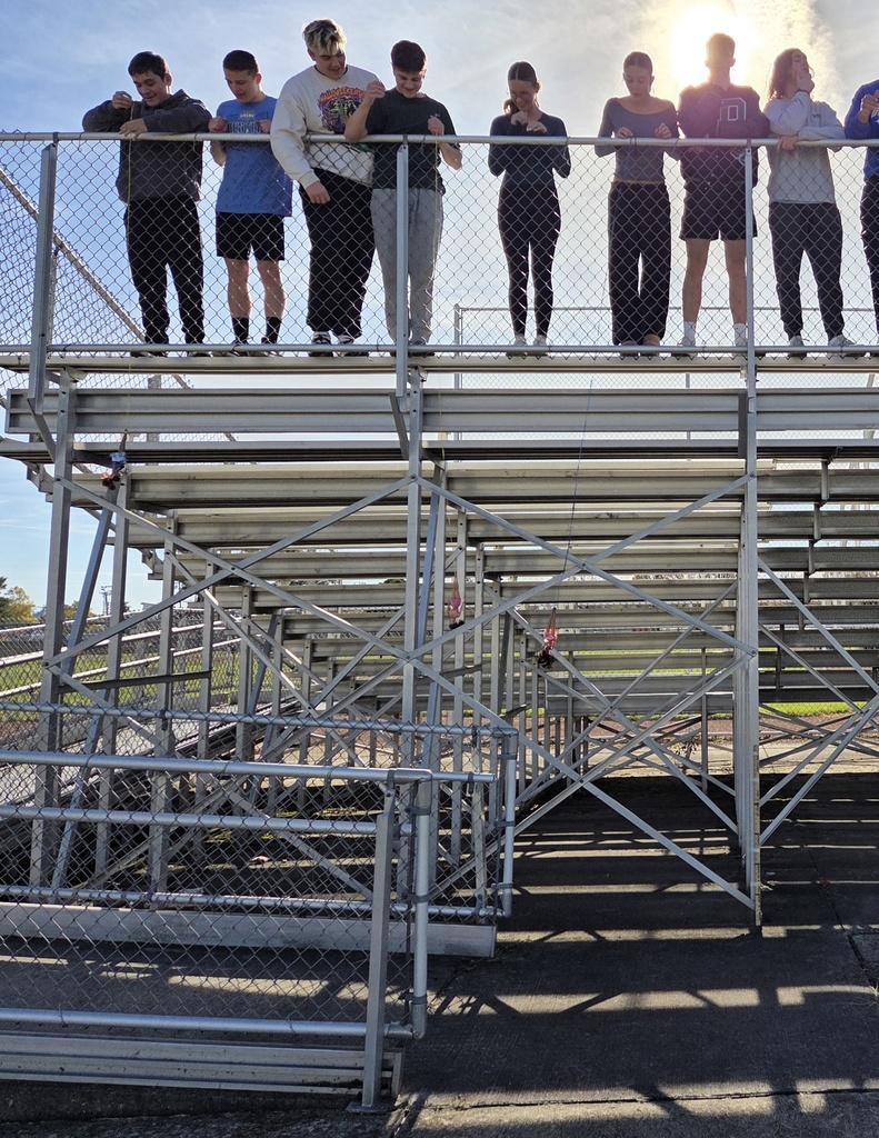 Students participating in a bungee drop