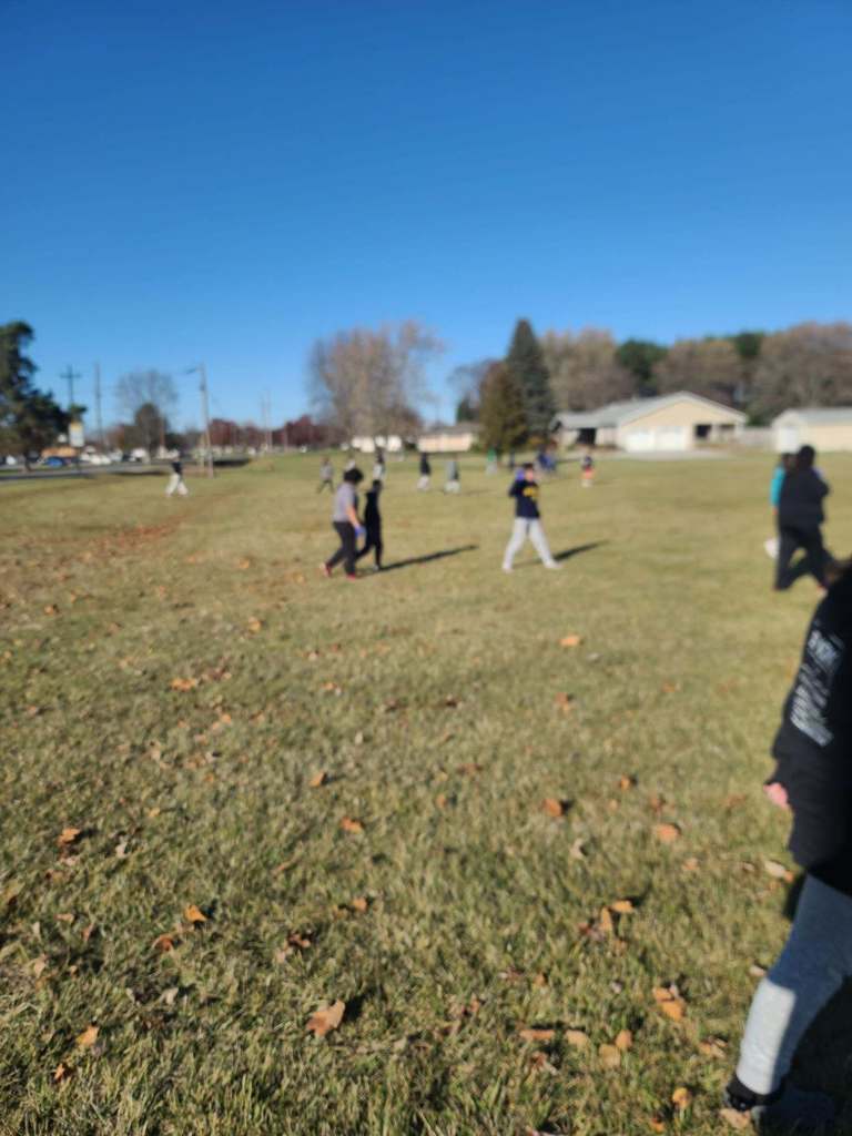 Students cleaning up the school grounds