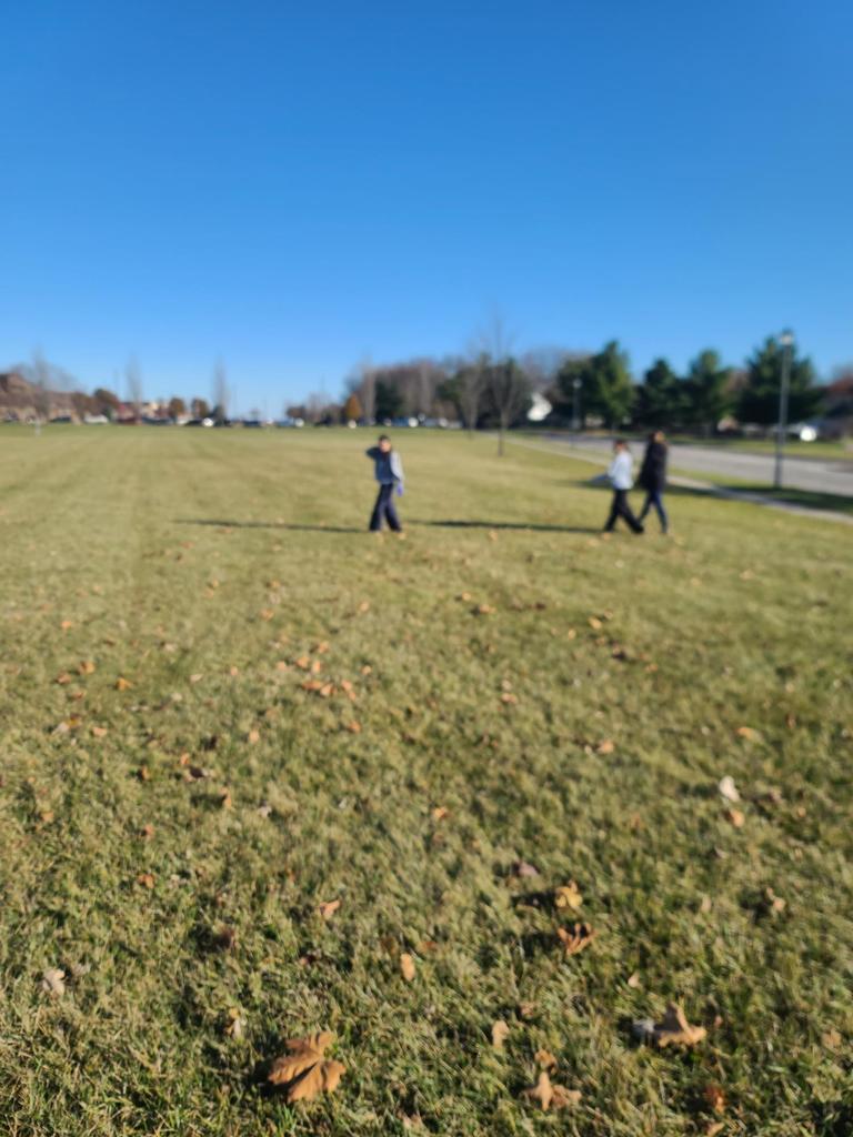 Students cleaning up the school grounds