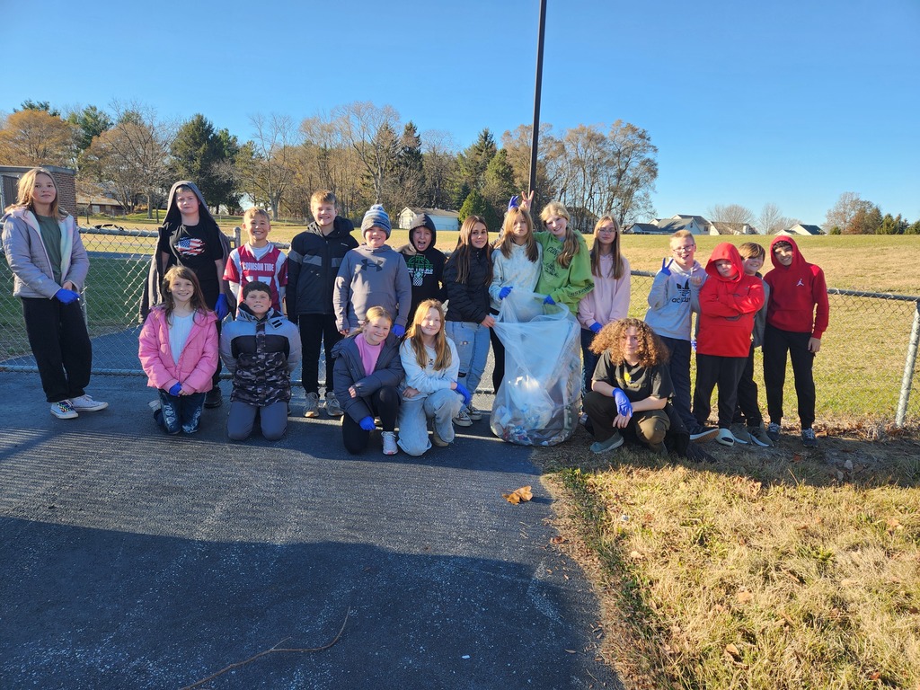 Students cleaning up the school grounds