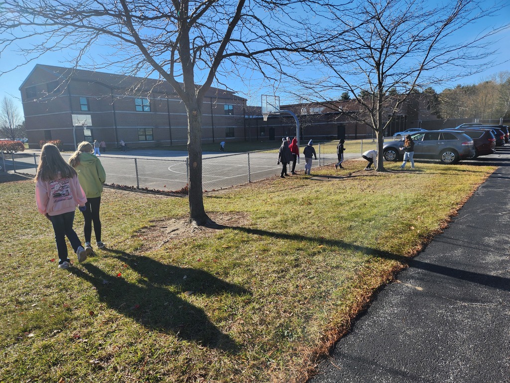 Students cleaning up the school grounds