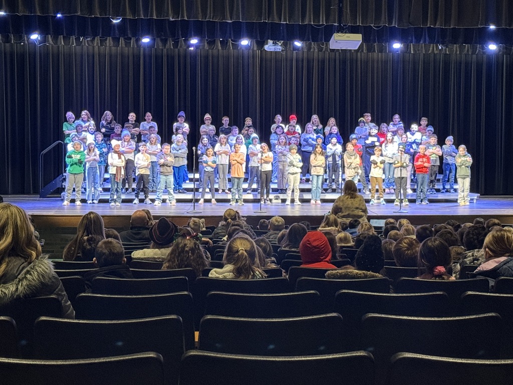 Students performing on stage