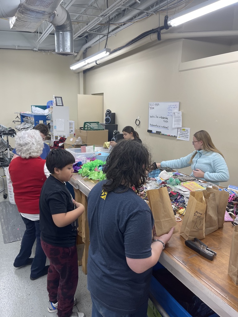 Students helping set up the Christmas shop