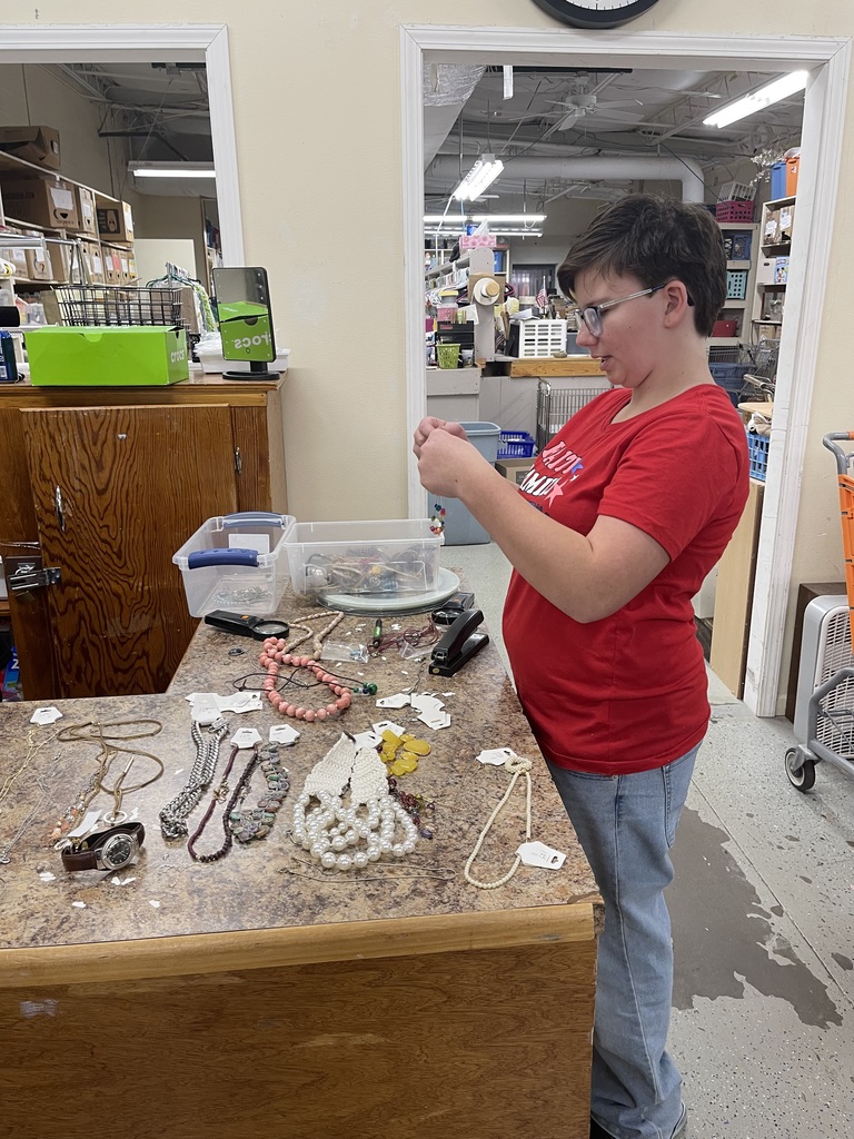 Students helping set up the Christmas shop
