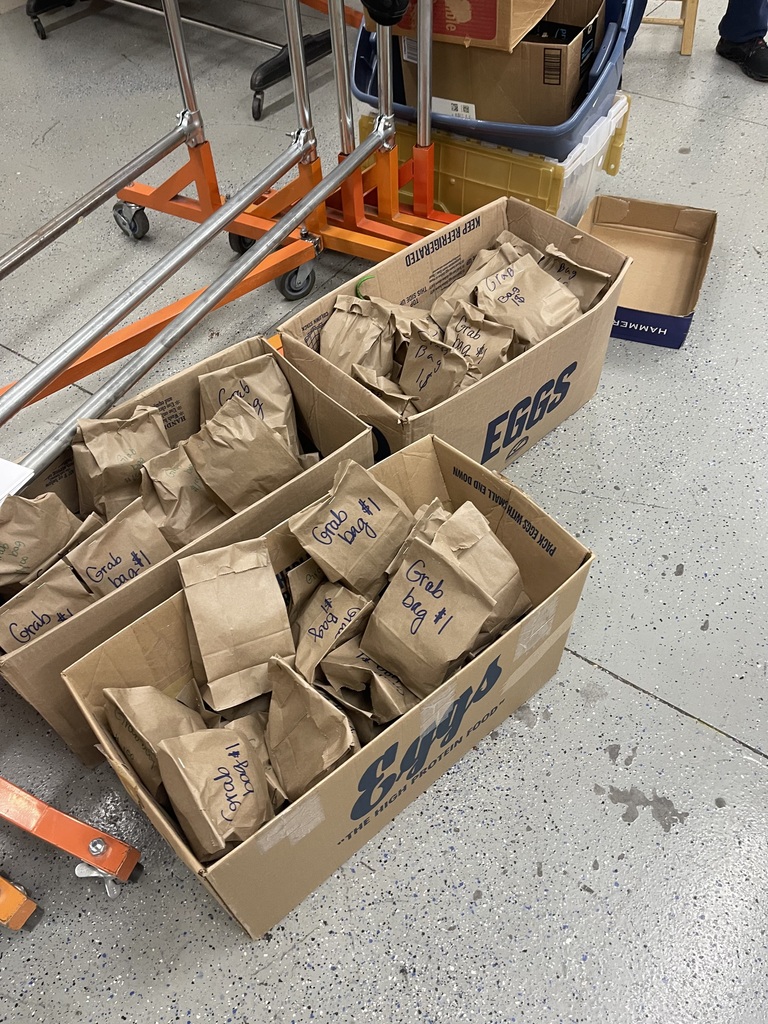 Students helping set up the Christmas shop