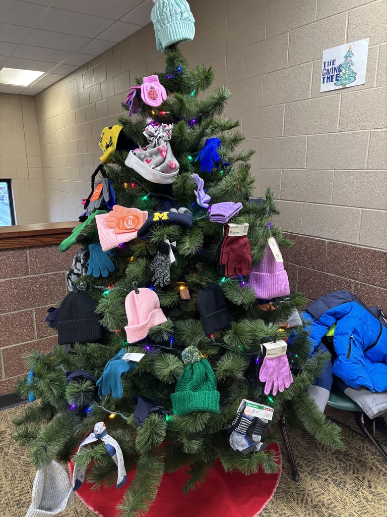 a tree with hats and gloves on it