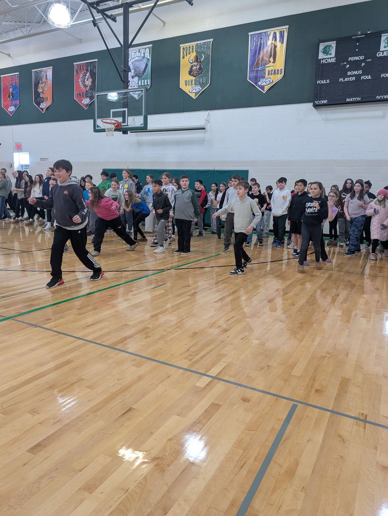 middle school students playing in a gym