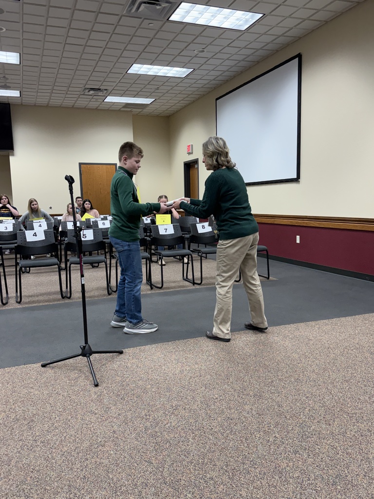 Student spelling in a spelling bee