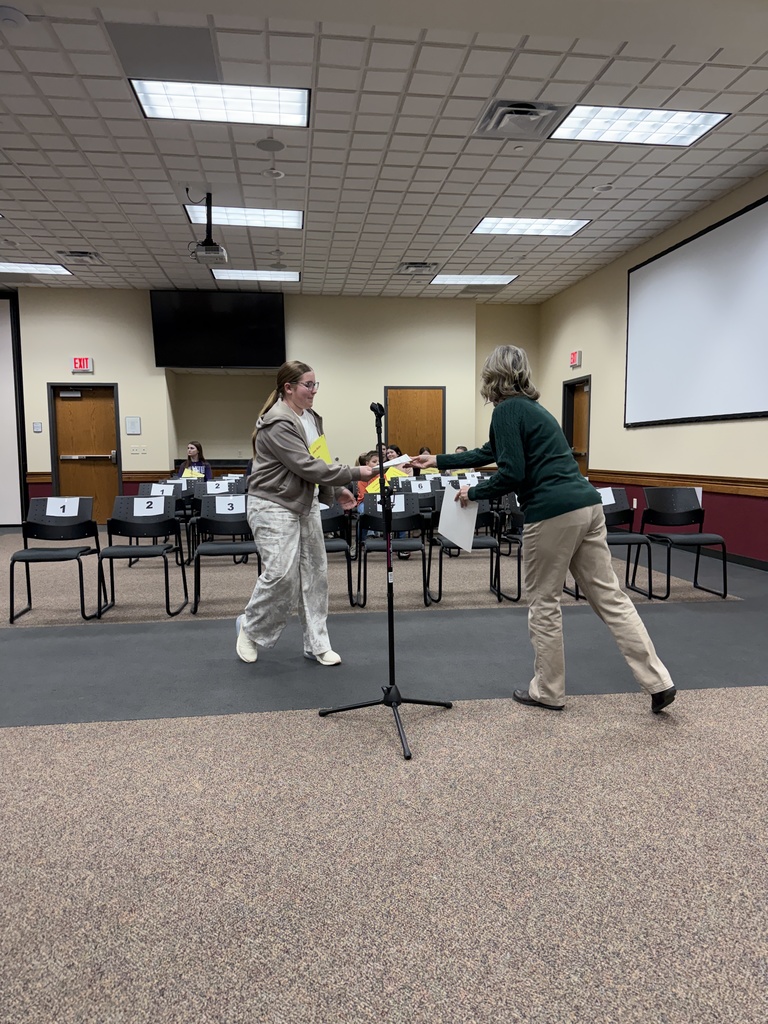 Student spelling in a spelling bee