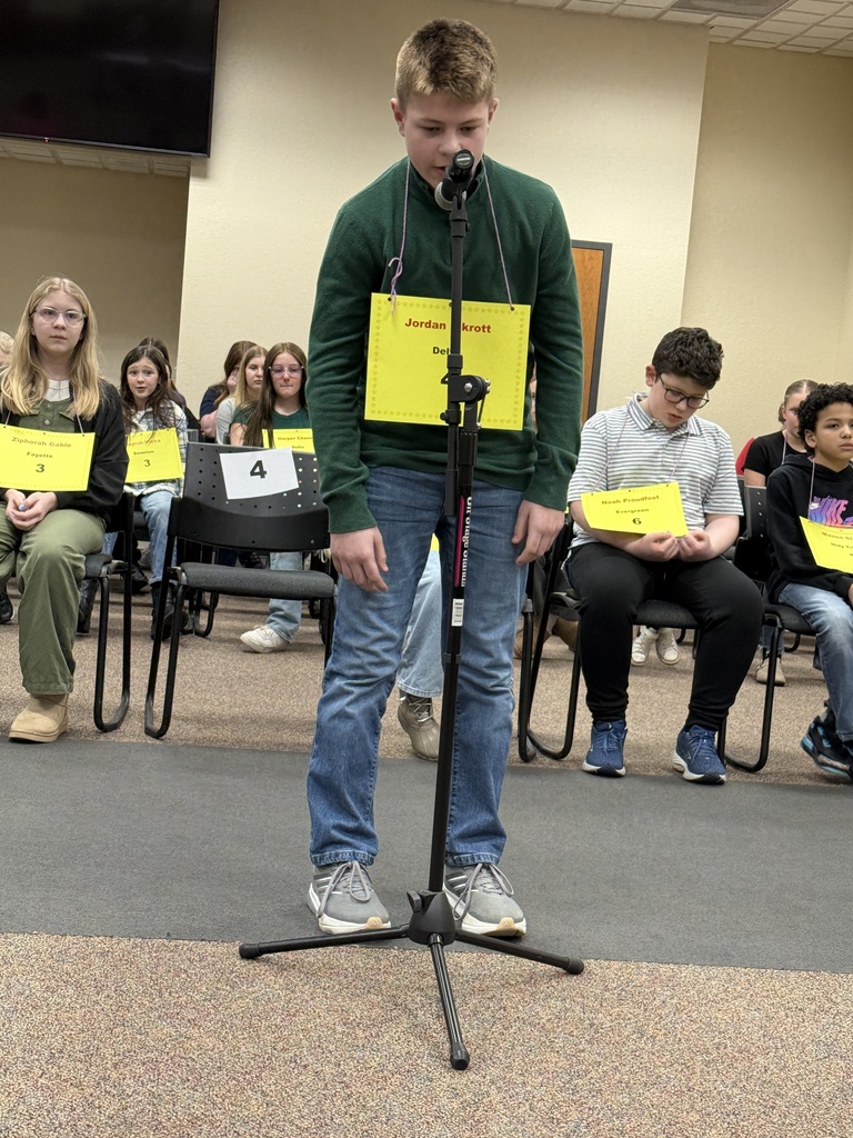 Student spelling in a spelling bee