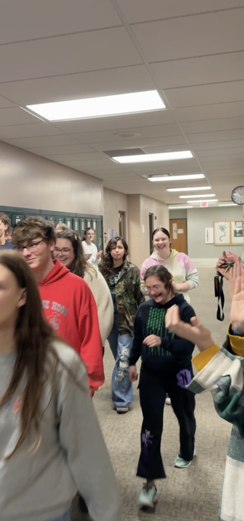 Archery members walking in the hall