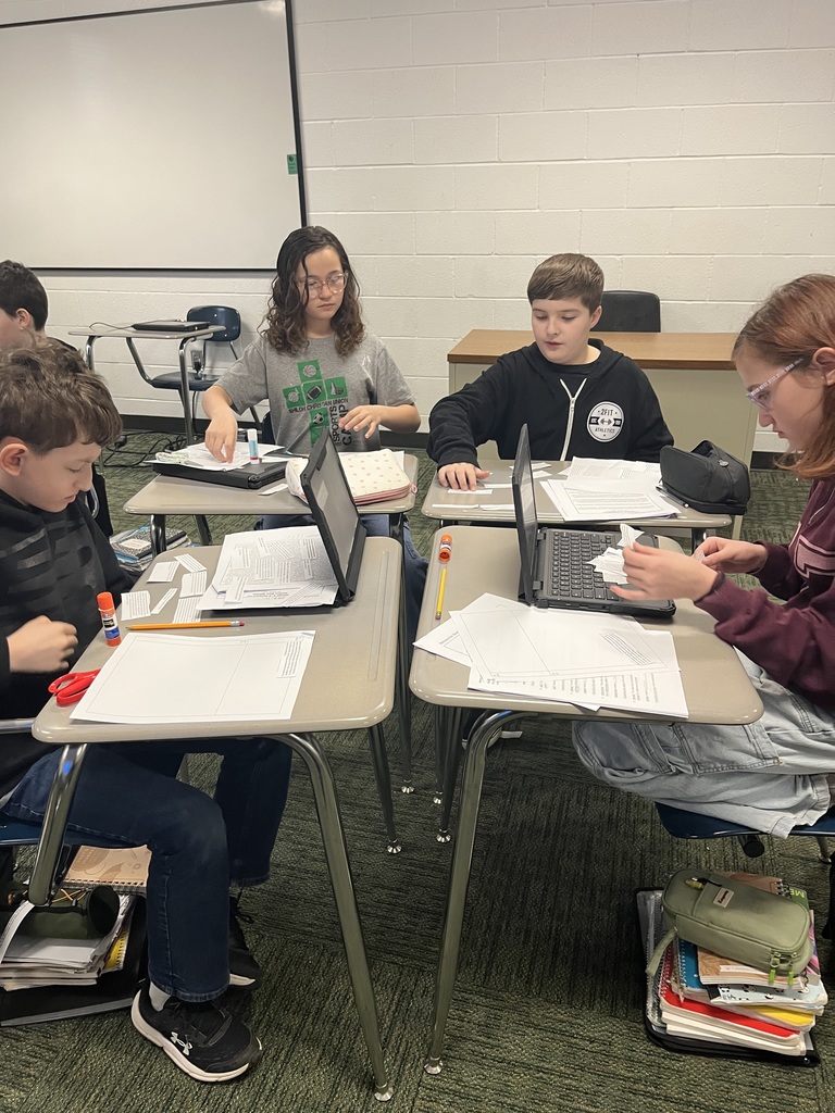 Students working together in a classroom