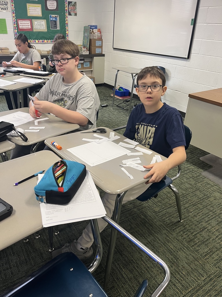 Students working together in a classroom