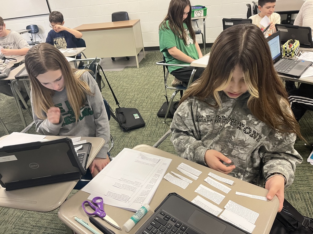 Students working together in a classroom