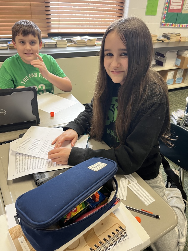 Students working together in a classroom