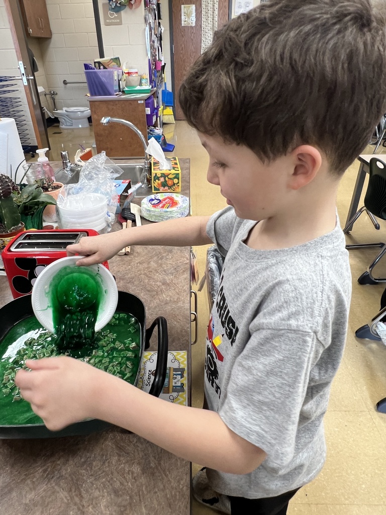 A student eating green eggs and ham