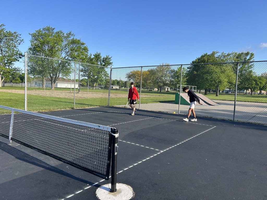 Students playing on the Pickle Ball courts