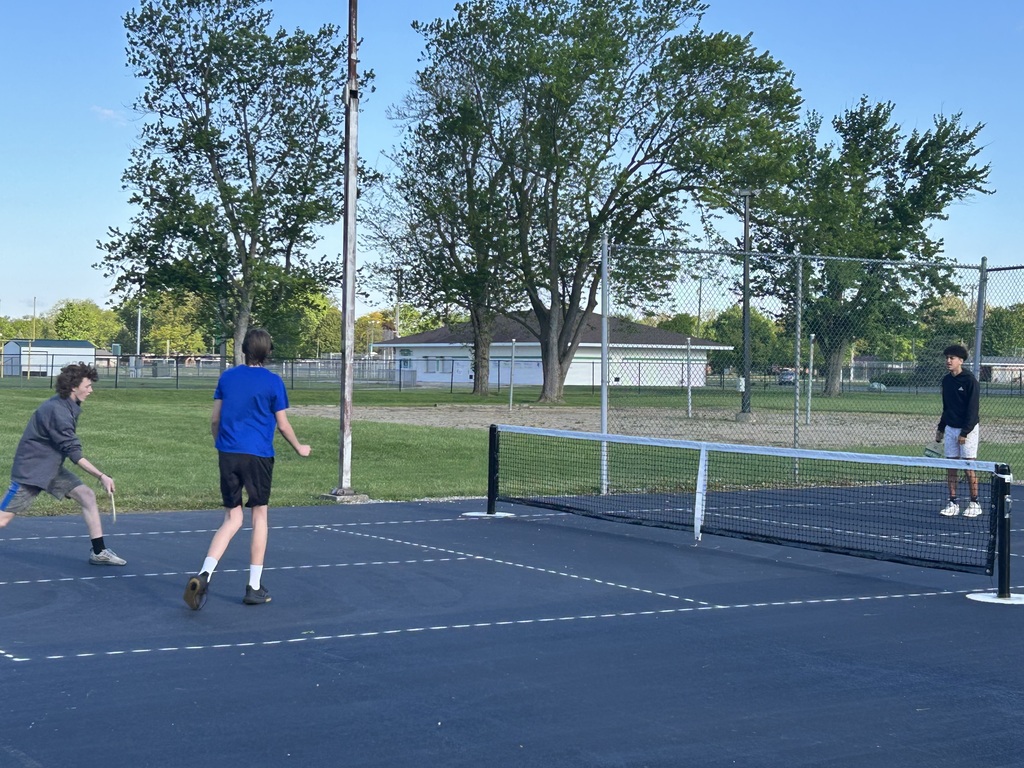 Students playing on the Pickle Ball courts
